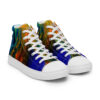 A pair of colorful sneakers on top of a white shoe.