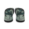 A pair of flip flops with a picture of trees.