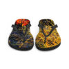 A pair of flip flops with an abstract design.