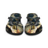 A pair of flip flops with a picture of a cat.
