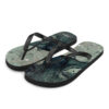 A pair of flip flops with an image of trees.