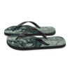 A pair of flip flops with a picture of a man and woman.
