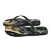 A pair of flip flops with a picture of a fish.