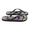 A pair of flip flops with a picture of a woman 's face.