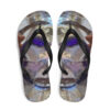 A pair of flip flops with an image of a face.