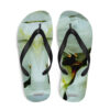 A pair of flip flops with an image of flowers.