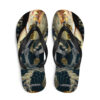 A pair of flip flops with a snake on them.