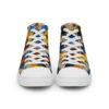 A pair of shoes with colorful squares on them.