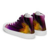 A pair of purple and yellow flower shoes.