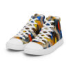 A pair of colorful sneakers on top of a white shoe.