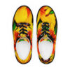 A pair of shoes with yellow and red flowers on them.