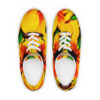 A pair of shoes with yellow and red flowers on them.