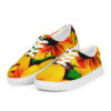 A pair of shoes with yellow and red flowers on them.