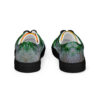 A pair of shoes with a picture of trees.