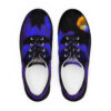 A pair of shoes with blue and black designs on them.
