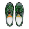 A pair of shoes with green leaves on them.