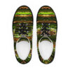 A pair of shoes with green and brown designs.
