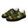 A pair of shoes with green and brown trees.