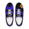 A pair of shoes with blue and black designs on them.