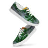 A pair of shoes with green leaves on them.