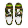A pair of shoes with green and brown designs.