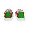 A pair of shoes with green and red designs.