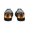 A pair of shoes with flames on them.