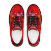 A pair of red shoes with black soles.