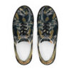 A pair of shoes with an abstract design on them.
