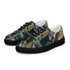 A pair of shoes with gold and black design.
