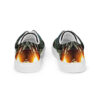 A pair of shoes with fire flames on them.