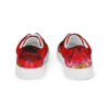A pair of red shoes with an image on them.