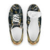A pair of shoes with a picture of a cat on them.