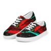 A pair of red and black shoes on top of a white shoe.