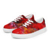 A pair of red shoes with a picture of flowers.