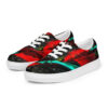 A pair of red and black shoes on top of a white shoe.