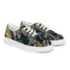 A pair of shoes with a picture of a cat on them.