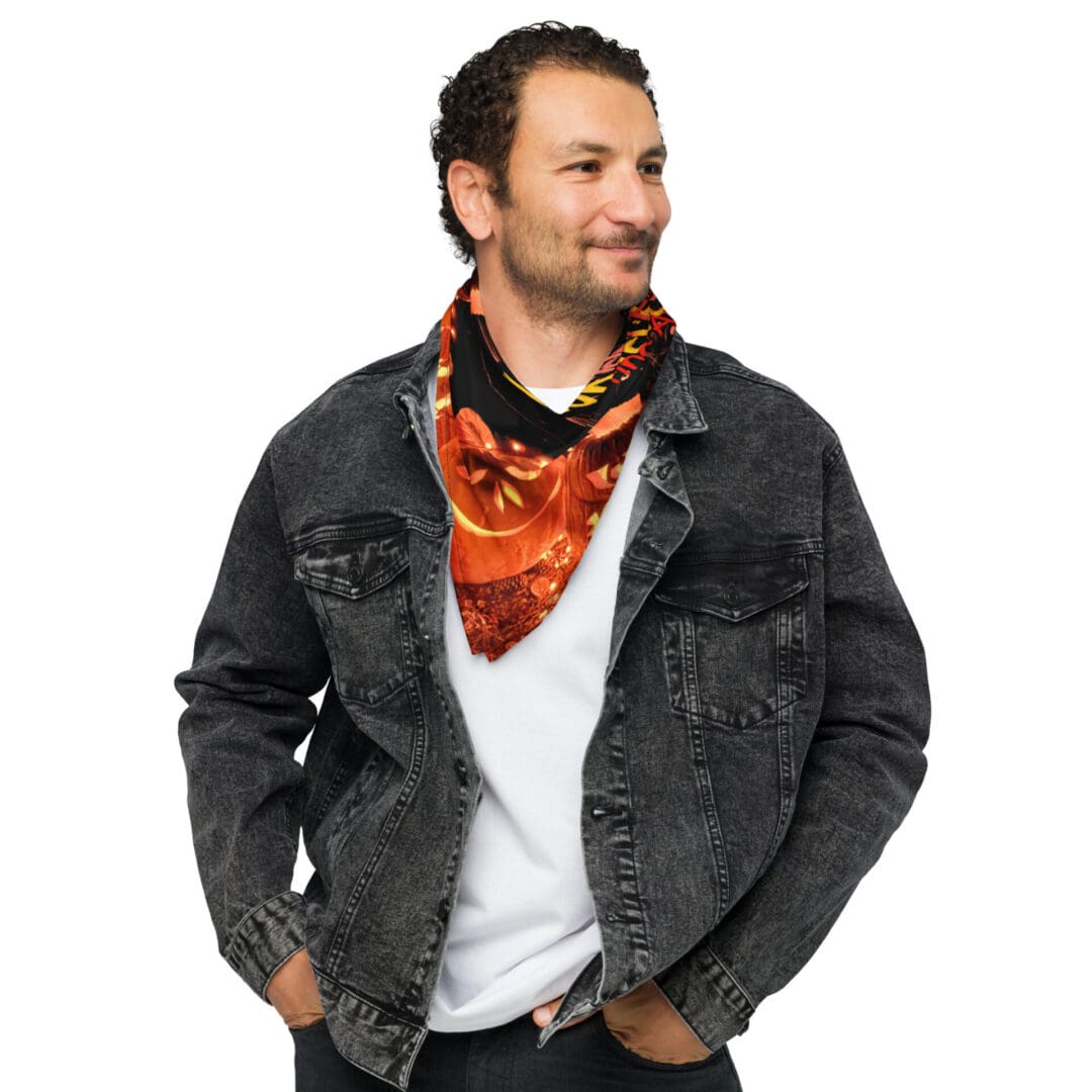 Man wearing a denim jacket and scarf.