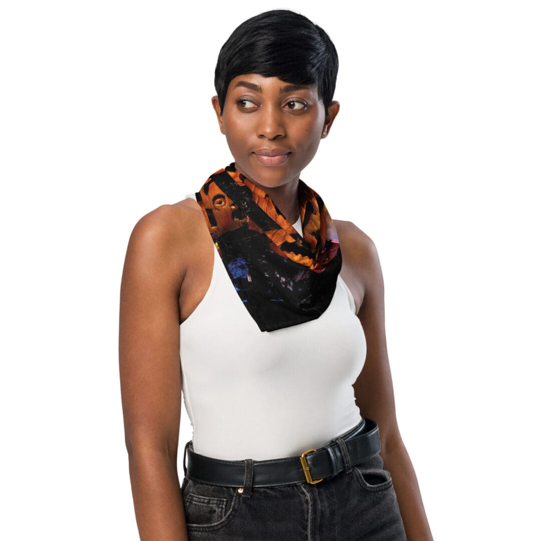 Woman wearing colorful scarf, white top.
