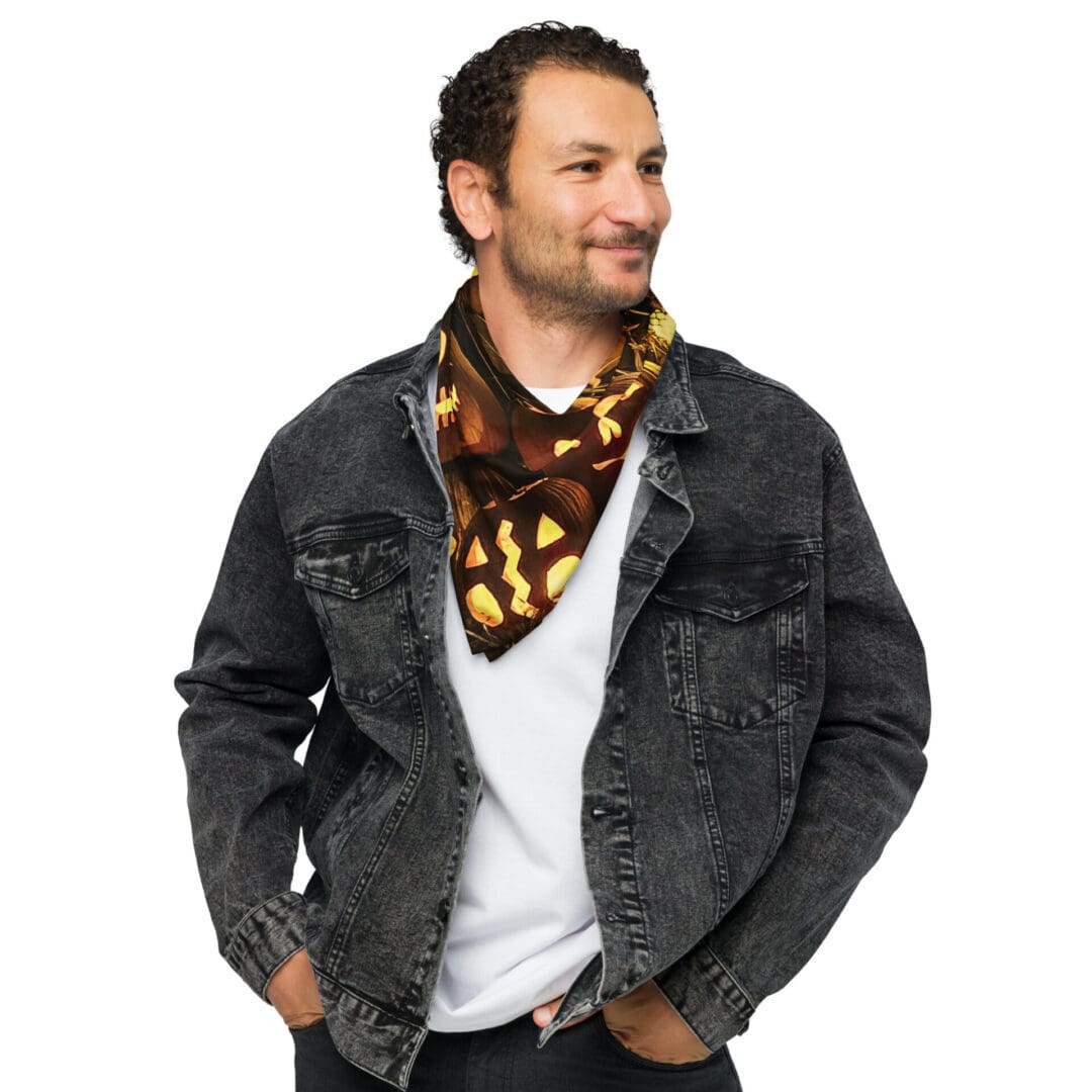 Man wearing denim jacket and festive scarf.