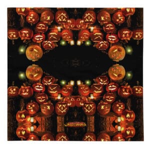 Symmetrical pattern of carved Halloween pumpkins.