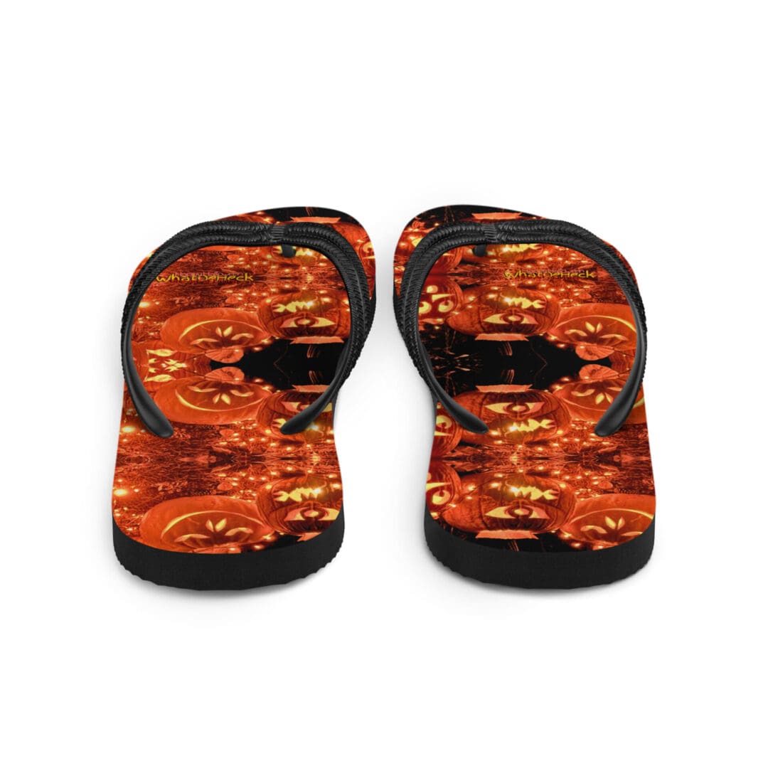 Halloween-themed flip-flops with pumpkin design.
