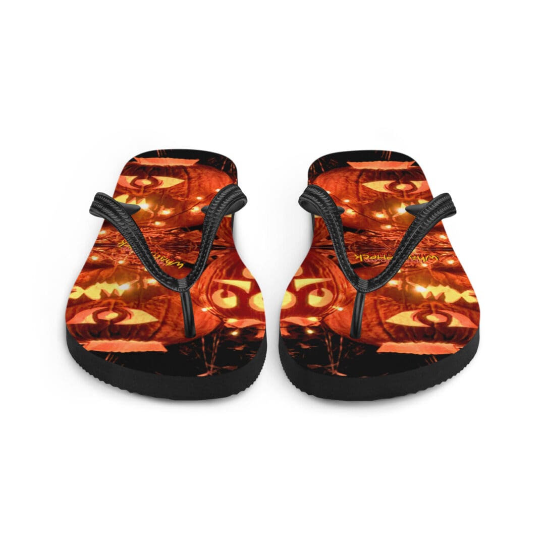 Colorful flip-flops with abstract orange design.