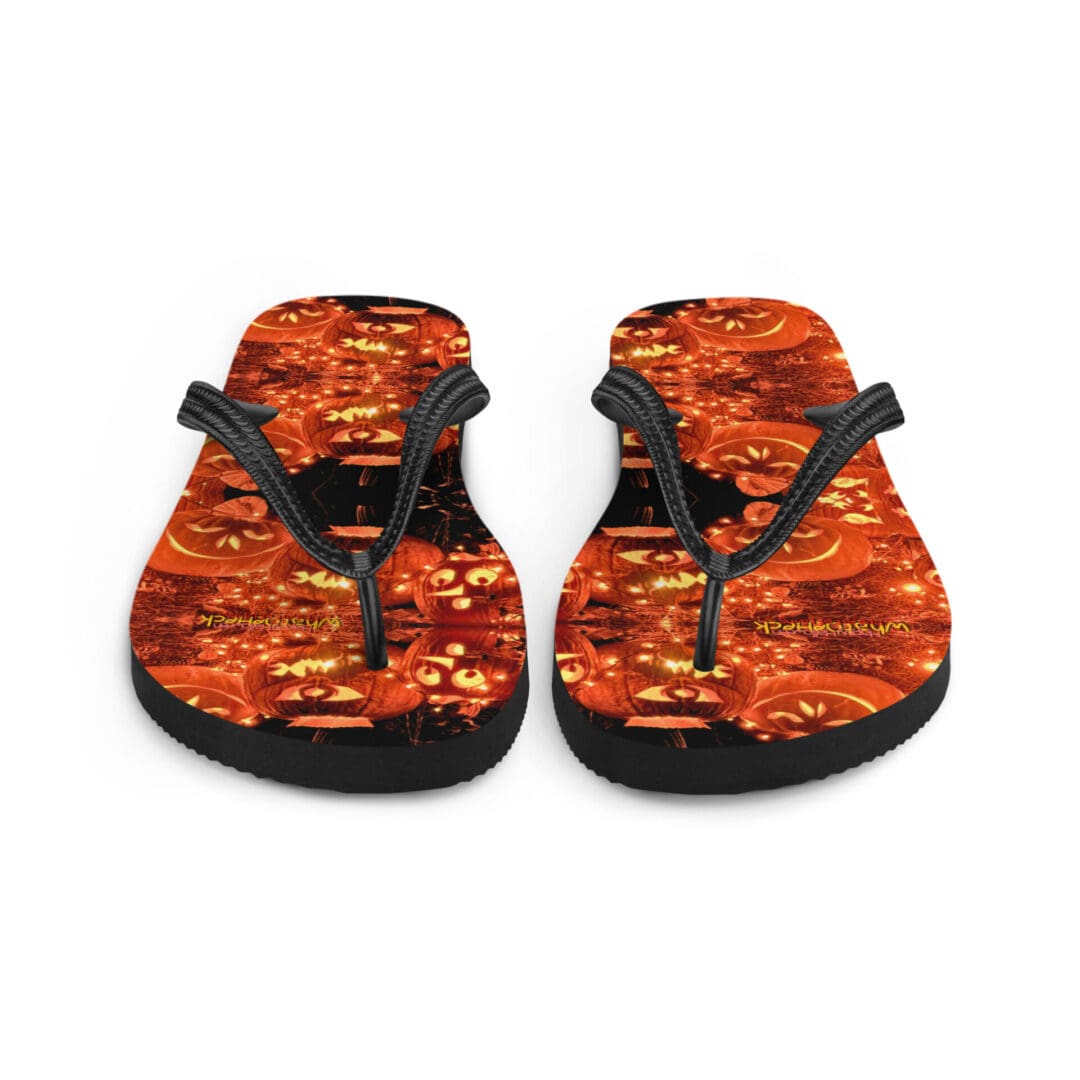 Halloween-themed flip-flops with pumpkin design.