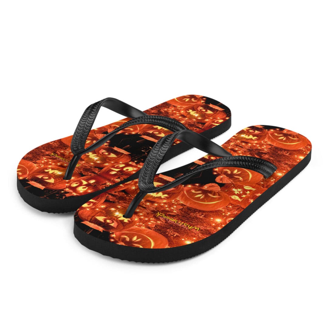 Halloween-themed flip-flops with pumpkin design.