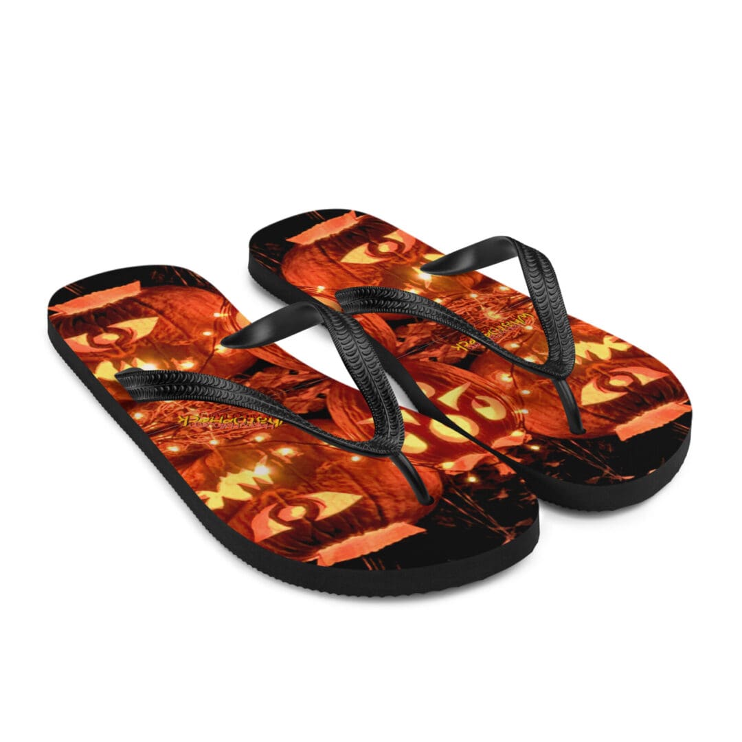 Halloween-themed flip-flops with pumpkin design.