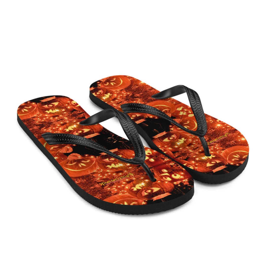 Halloween-themed flip-flops with jack-o'-lantern design.