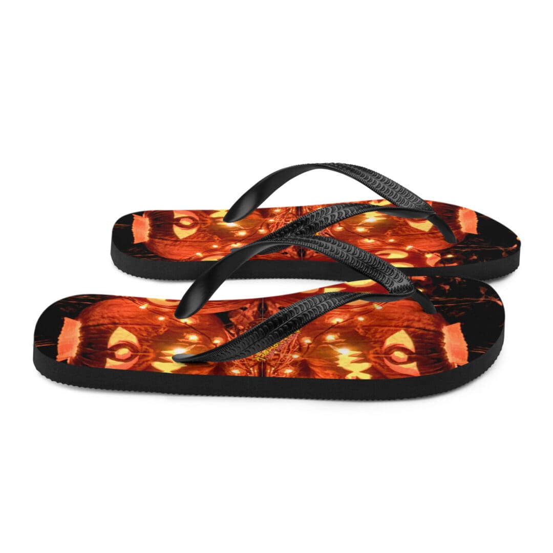 Black and orange patterned flip-flops.