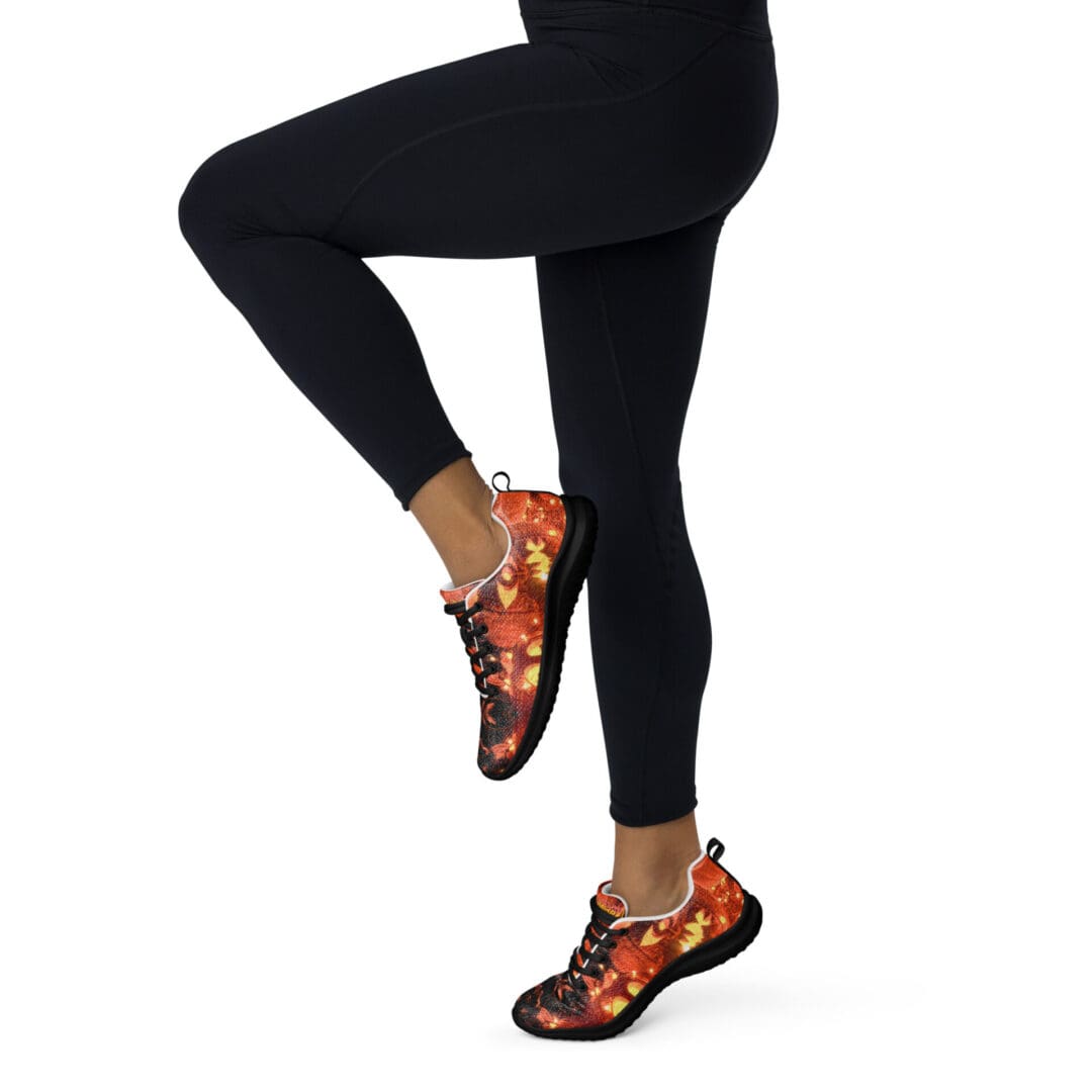 Legs wearing black leggings and colorful sneakers.