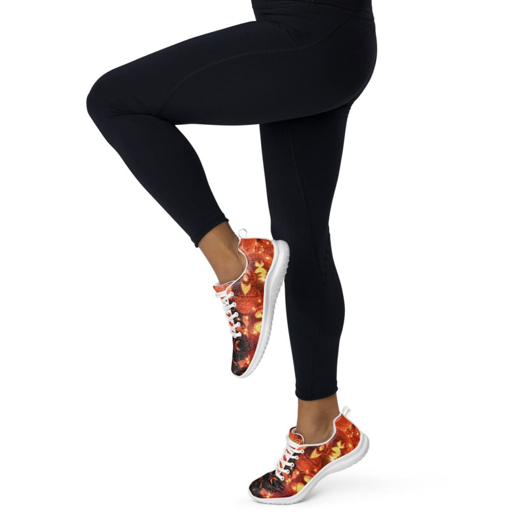 Legs wearing black leggings and autumn sneakers.